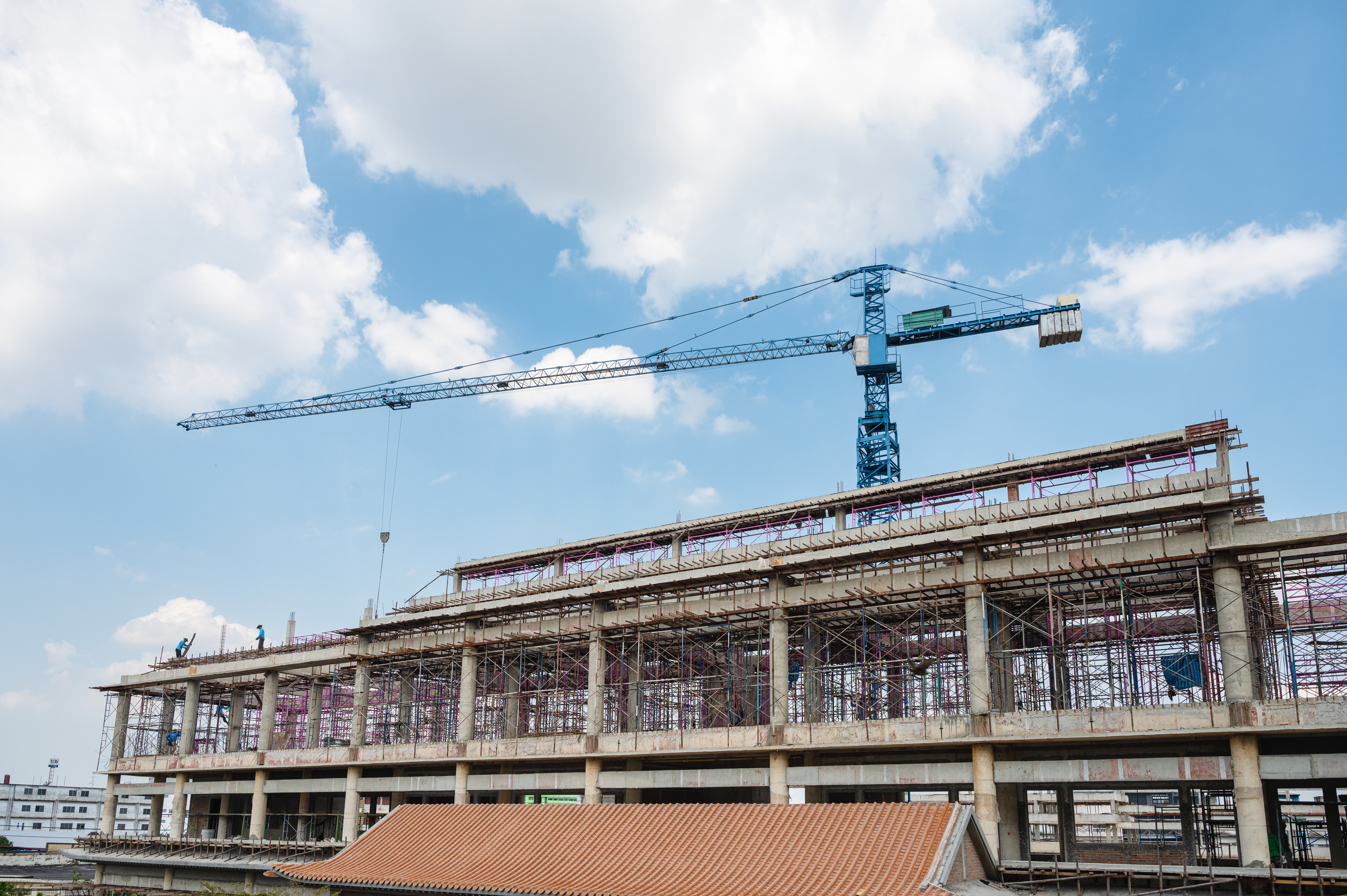 Industrial warehouse under construction with steel framing