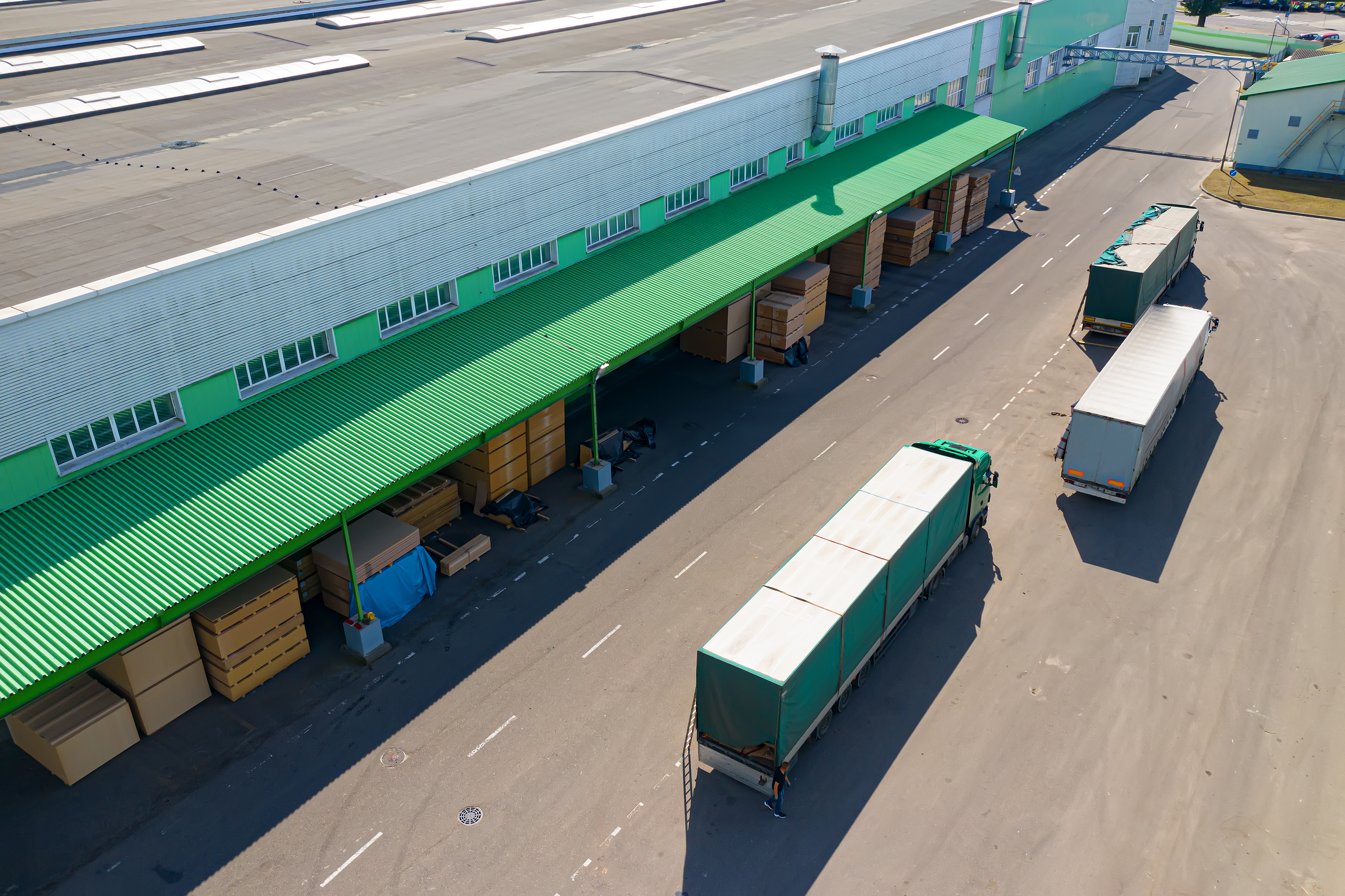 Multi-tenant industrial flex building exterior with dock doors and truck court